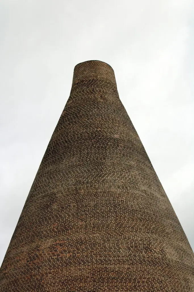 Red House Glass Cone pictured against a grey sky